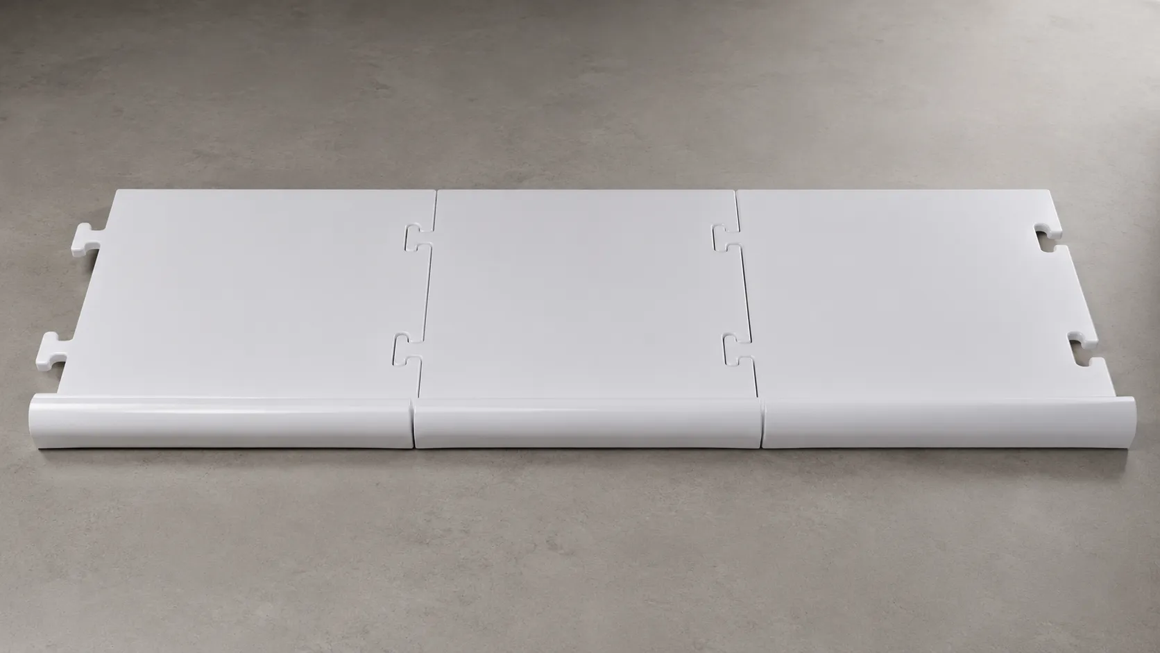 Modular white HIPS shelf stopper manufactured by thermoforming.